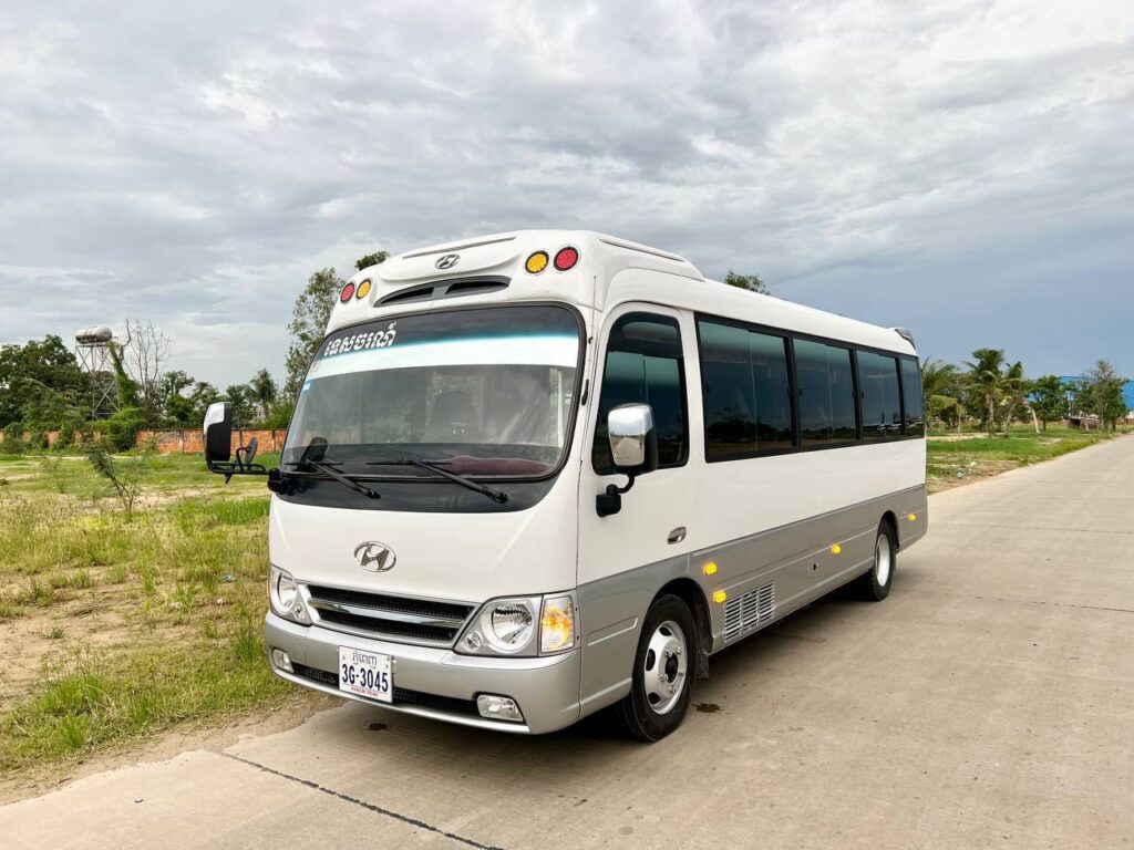 Cambodia Transportation Guide 2026 featuring private taxi, bus, train, flight, tuk-tuk, and ferry transportation options in Cambodia with Angkor Wat background.