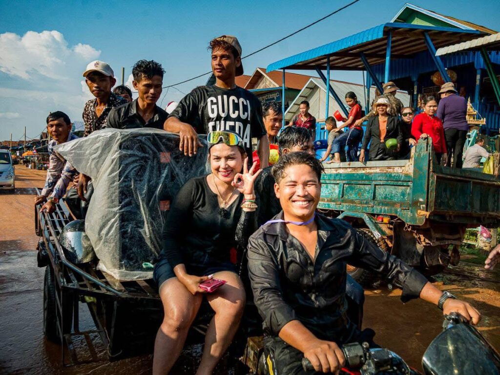 Cambodia Transportation Guide 2026 featuring private taxi, bus, train, flight, tuk-tuk, and ferry transportation options in Cambodia with Angkor Wat background.